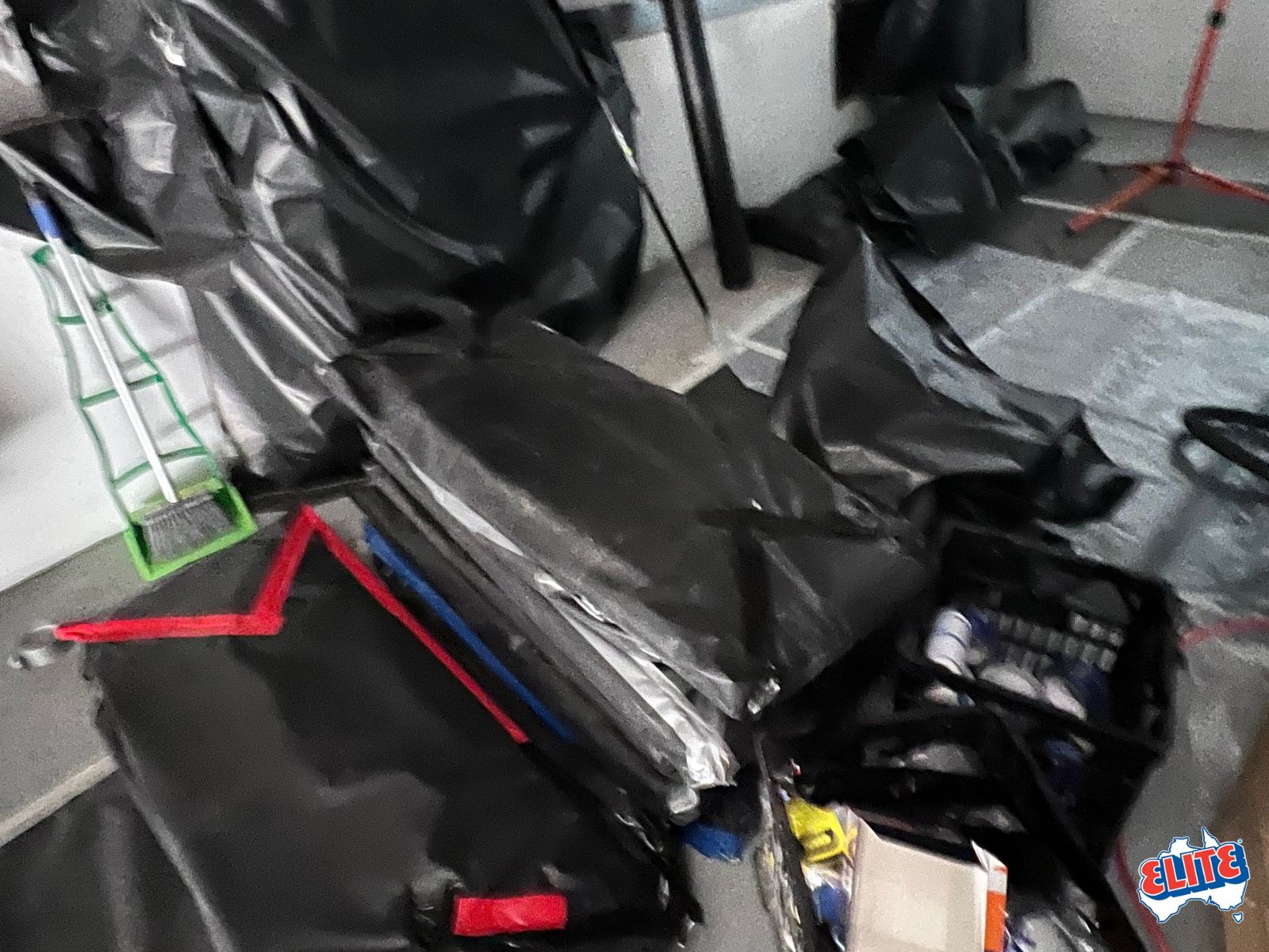 Sealed and labelled asbestos waste packaged for licensed transport